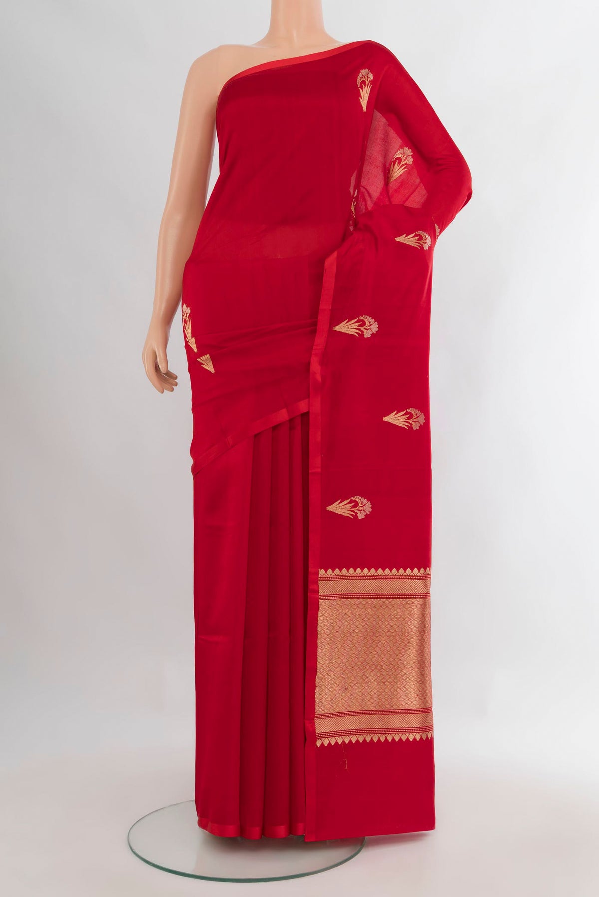 Pure Silk Red Banarasi Katan Saree with Zari Butta on the body and Without Border.  displayed on a mannequin