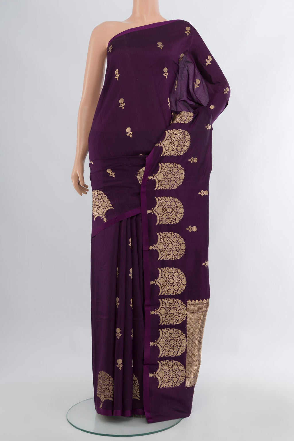 Violet Banarasi Katan Silk Saree with Zari Butta on the body and Zari Border.  displayed on a mannequin