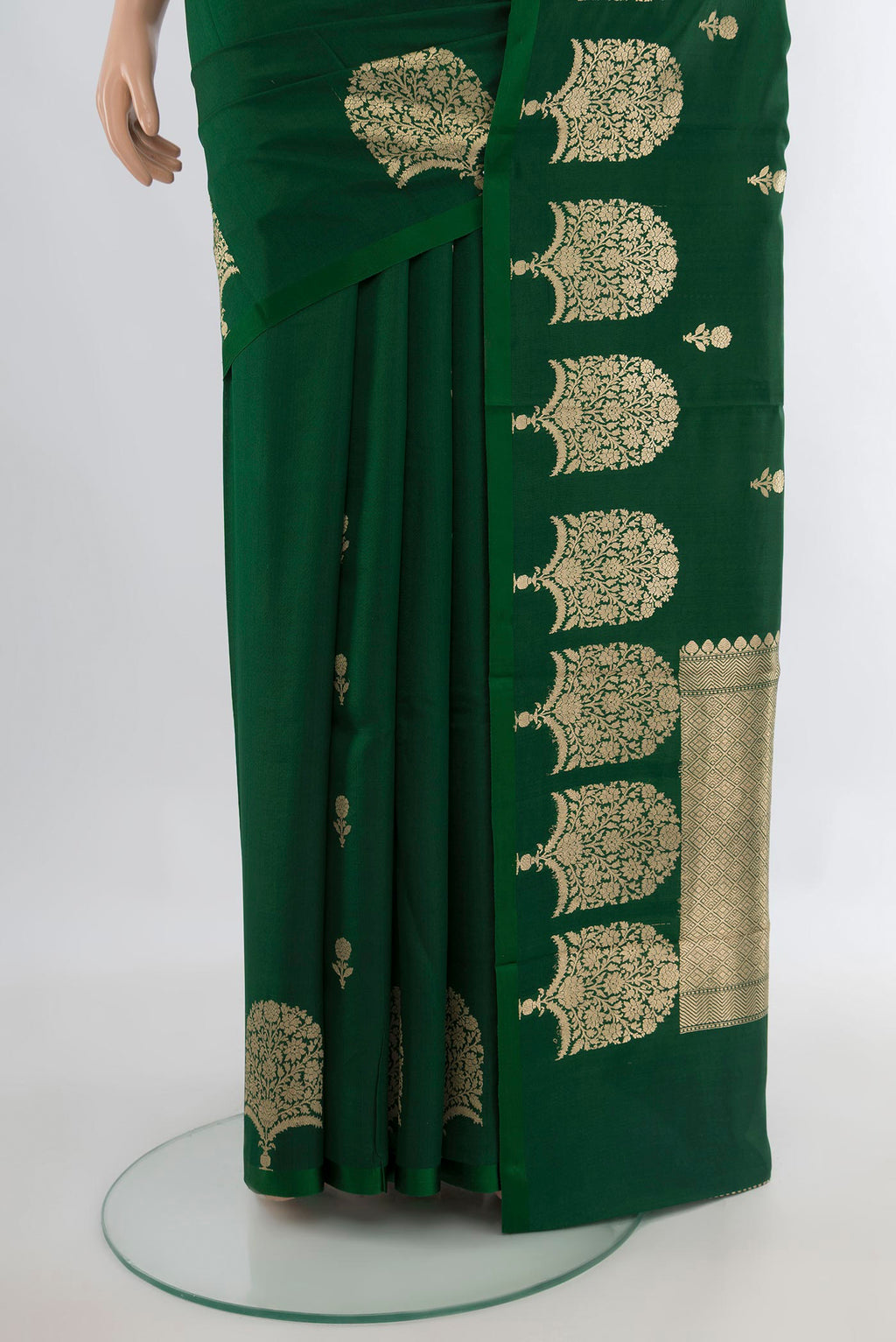 Pleats and pallu of Pure Silk Green Banarasi Katan Saree with Zari Butta on the body and Plain Border. 