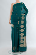 Peacock Blue Banarasi Katan Silk Saree with Zari Butta on the body and Fancy Border.  displayed on a mannequin