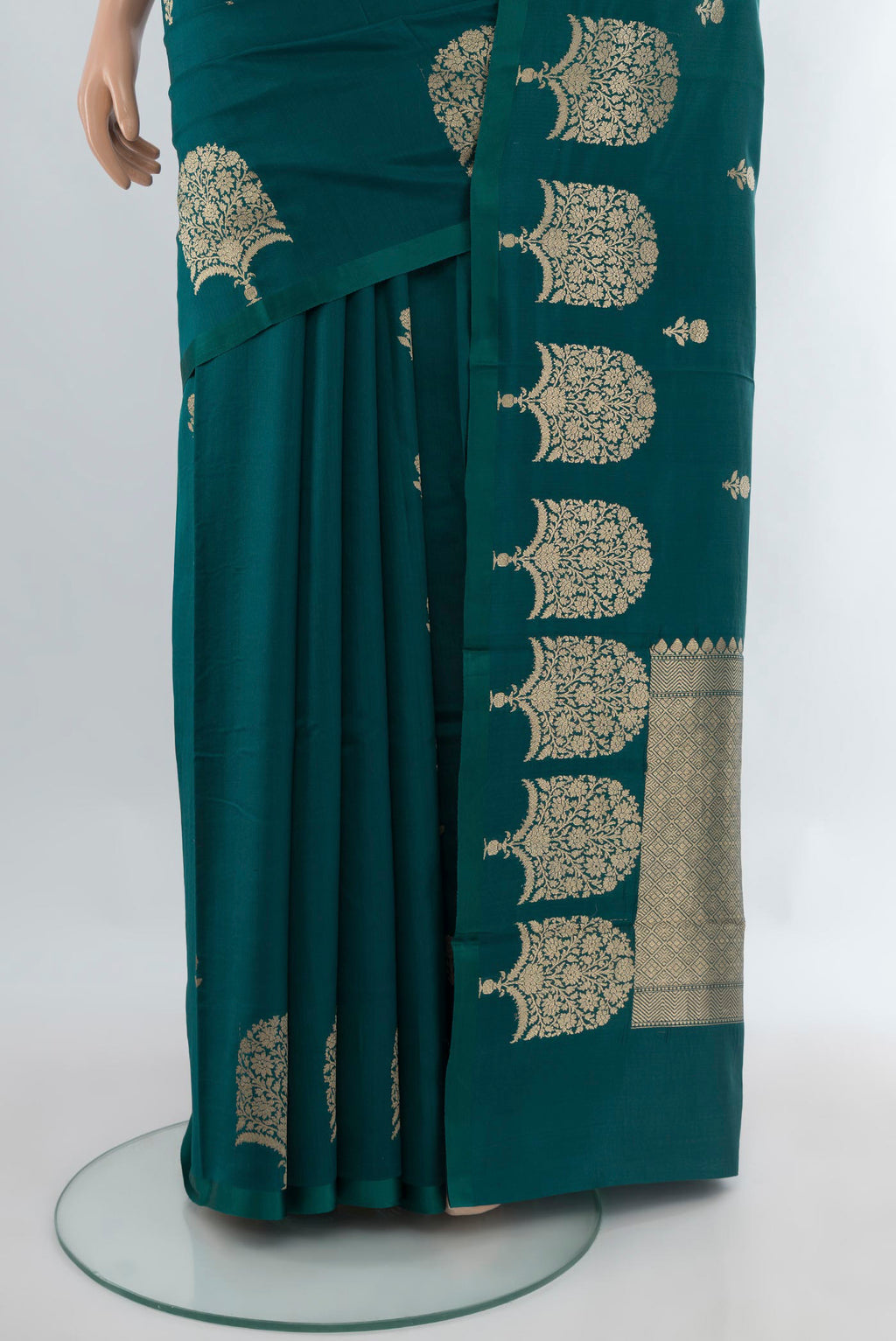 Pleats and pallu of Peacock Blue Banarasi Katan Silk Saree with Zari Butta on the body and Fancy Border. 