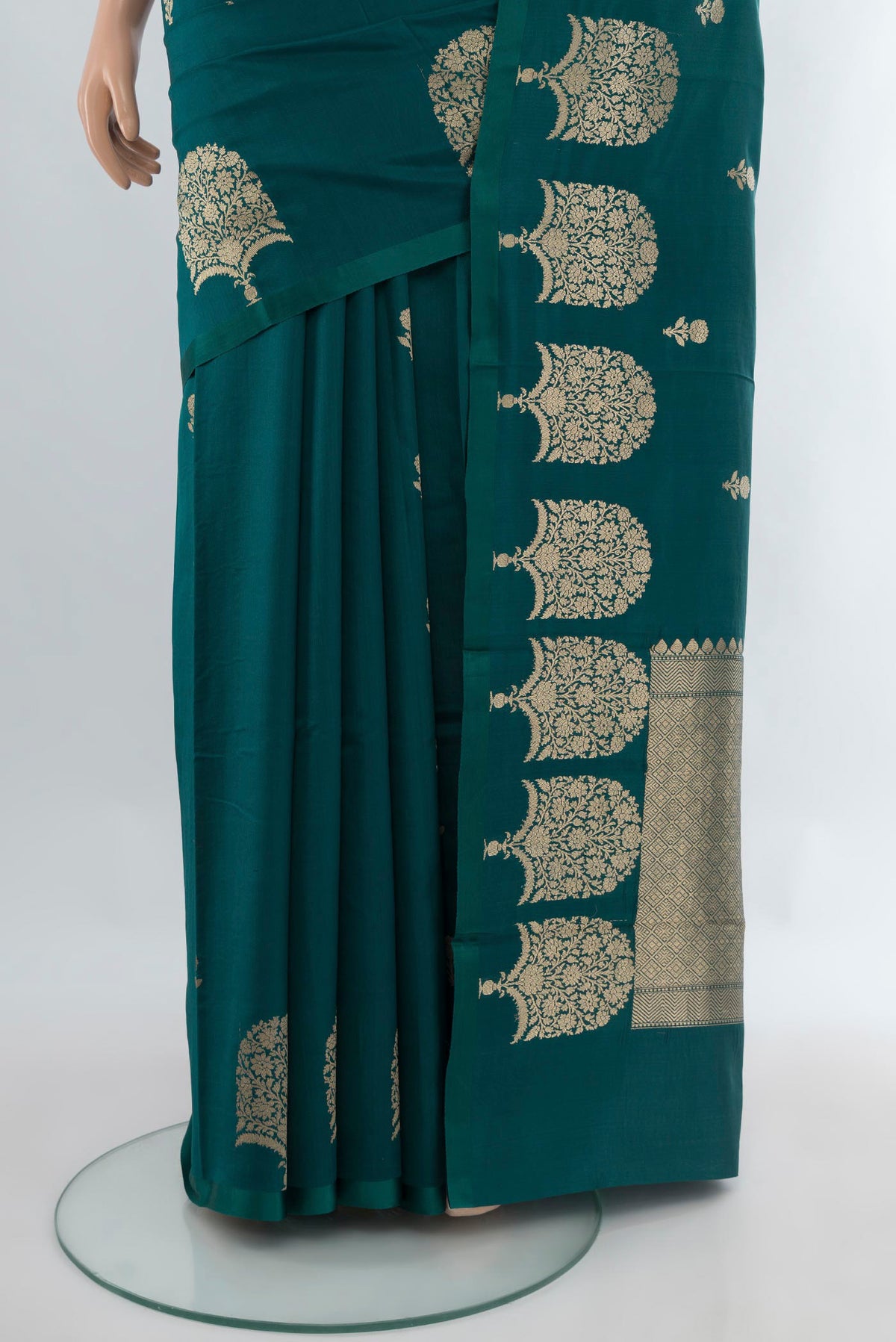 Pleats and pallu of Peacock Blue Banarasi Katan Silk Saree with Zari Butta on the body and Fancy Border. 