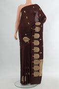 Coffee Brown Banarasi Katan Silk Saree with Zari Butta on the body and Fancy Border.  displayed on a mannequin