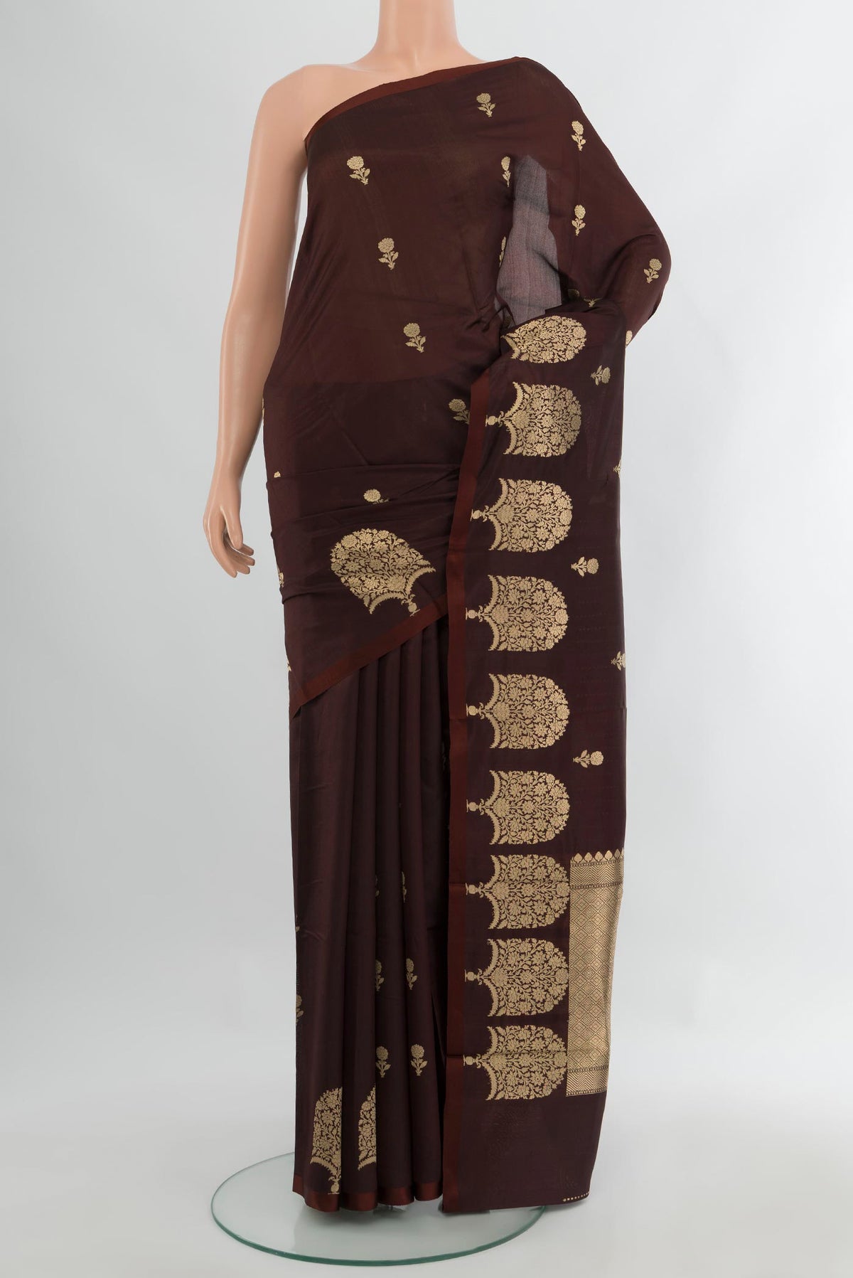 Coffee Brown Banarasi Katan Silk Saree with Zari Butta on the body and Fancy Border.  displayed on a mannequin
