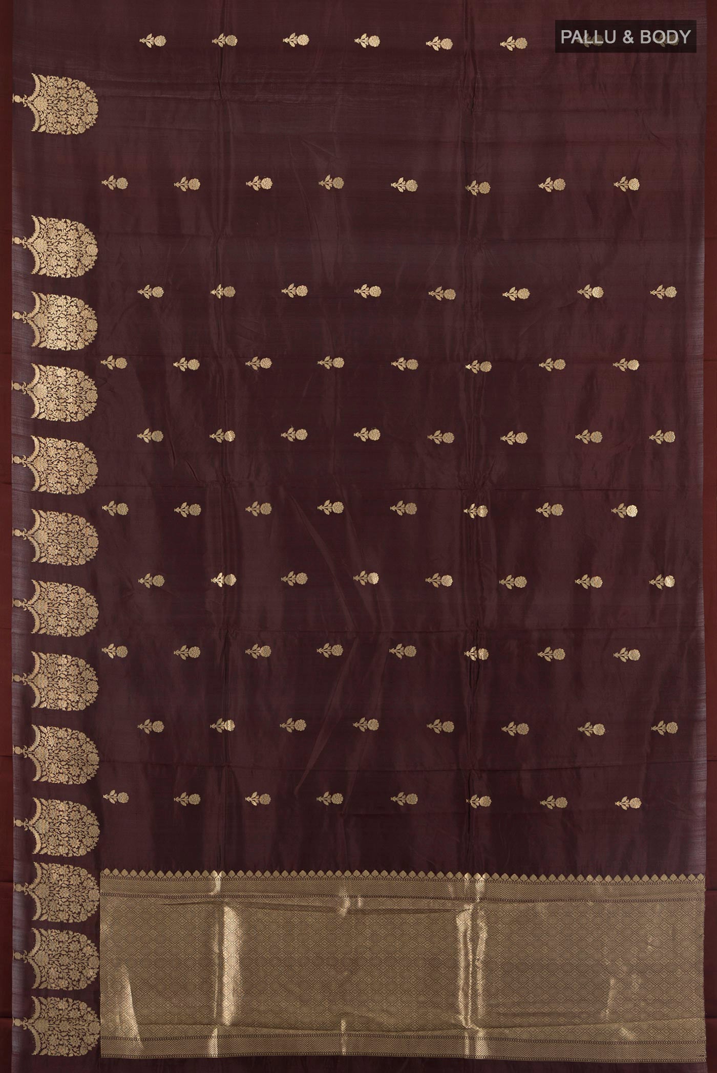 Flat view of Coffee Brown Banarasi Katan Silk Saree with Zari Butta on the body and Fancy Border. 