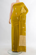 Pure Silk Mehandi Green Banarasi Katan Saree with Zari Butta on the body and Plain Border.  displayed on a mannequin