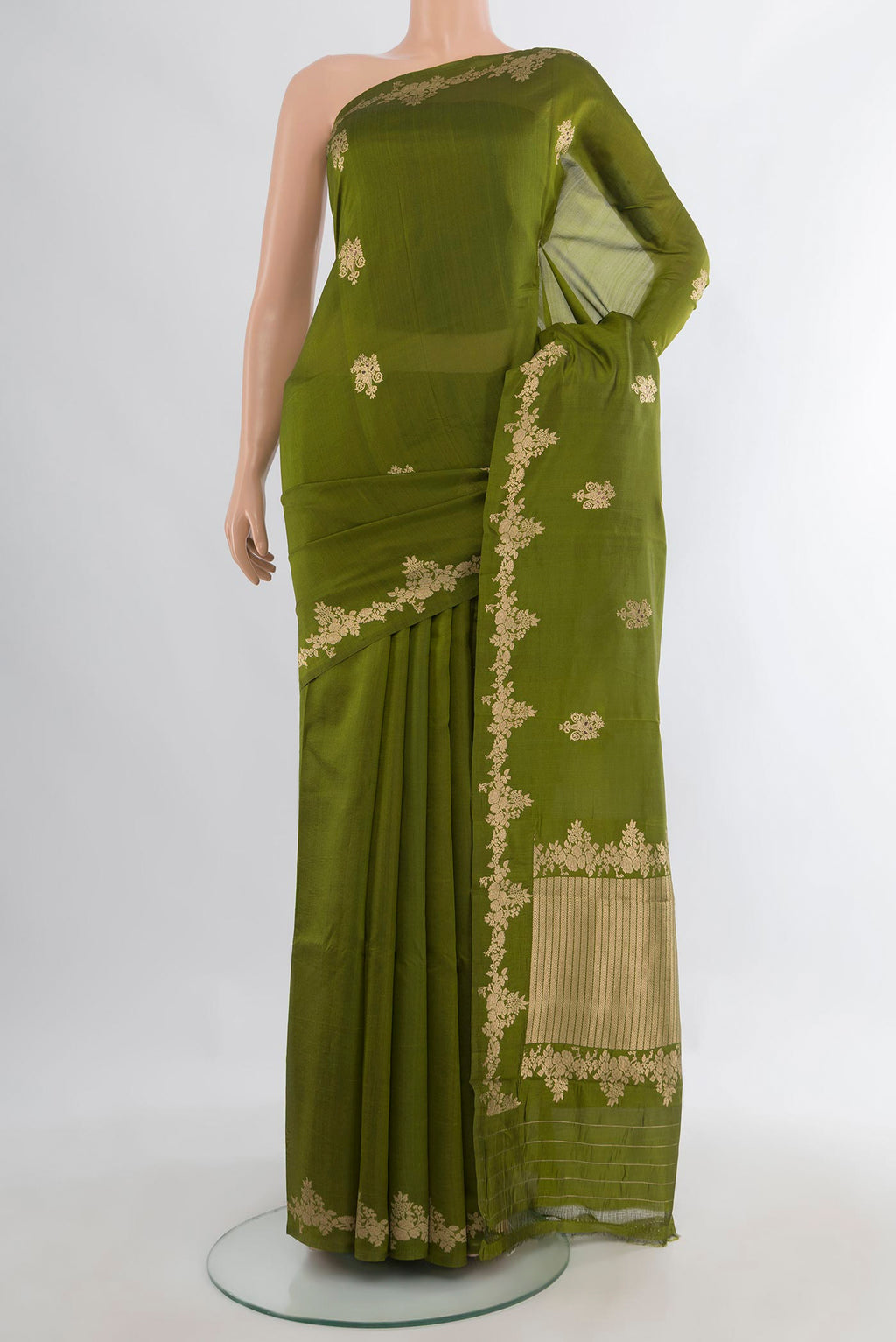 Pure Silk Mehandi Green Banarasi Katan Saree with Zari Butta on the body and Zari Border.  displayed on a mannequin