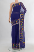 Royal Blue Linen Saree with Plain Body and Embroidery Border.  displayed on a mannequin