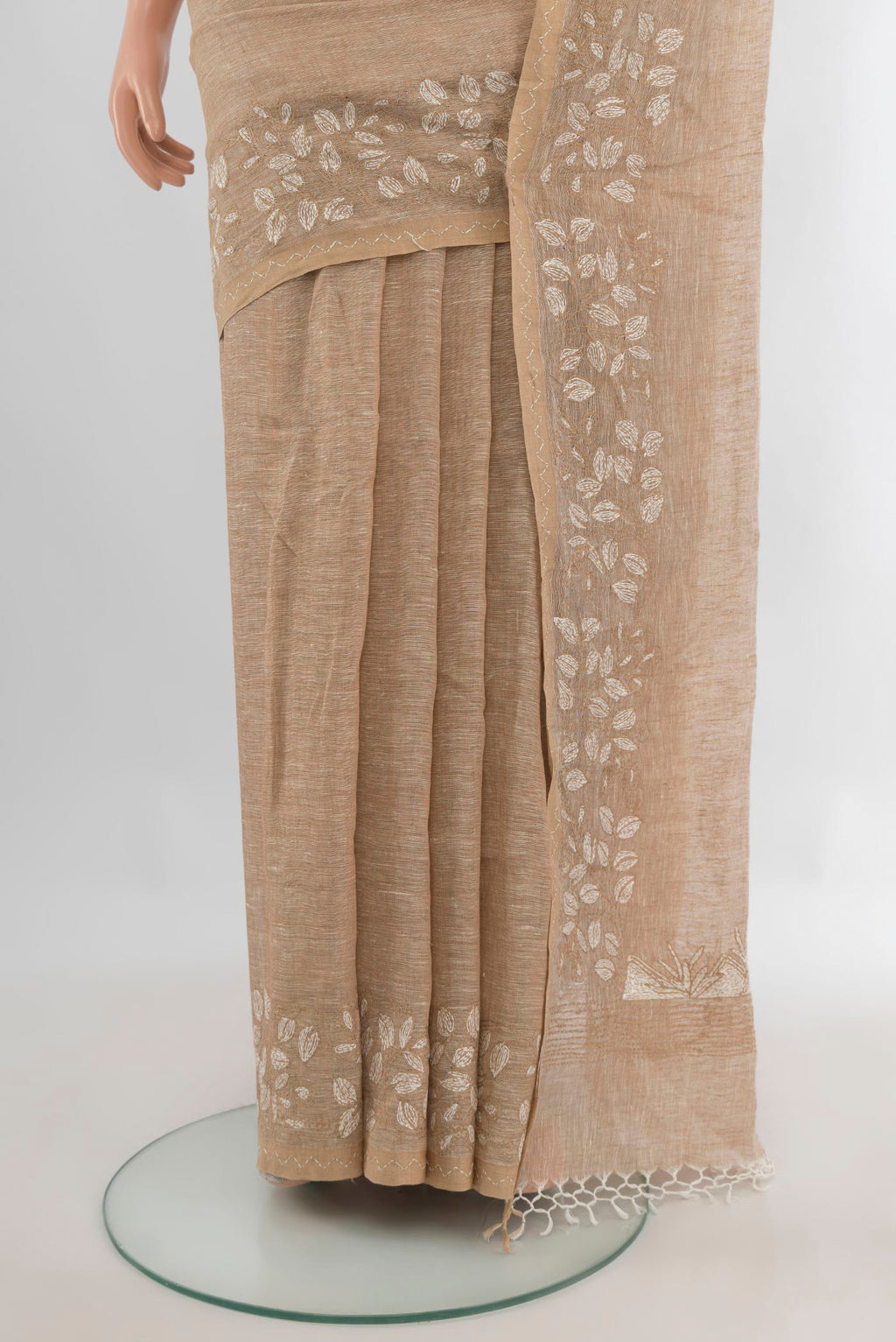 Pleats and pallu of Beige Linen Saree with Plain Body and Embroidery Border. 