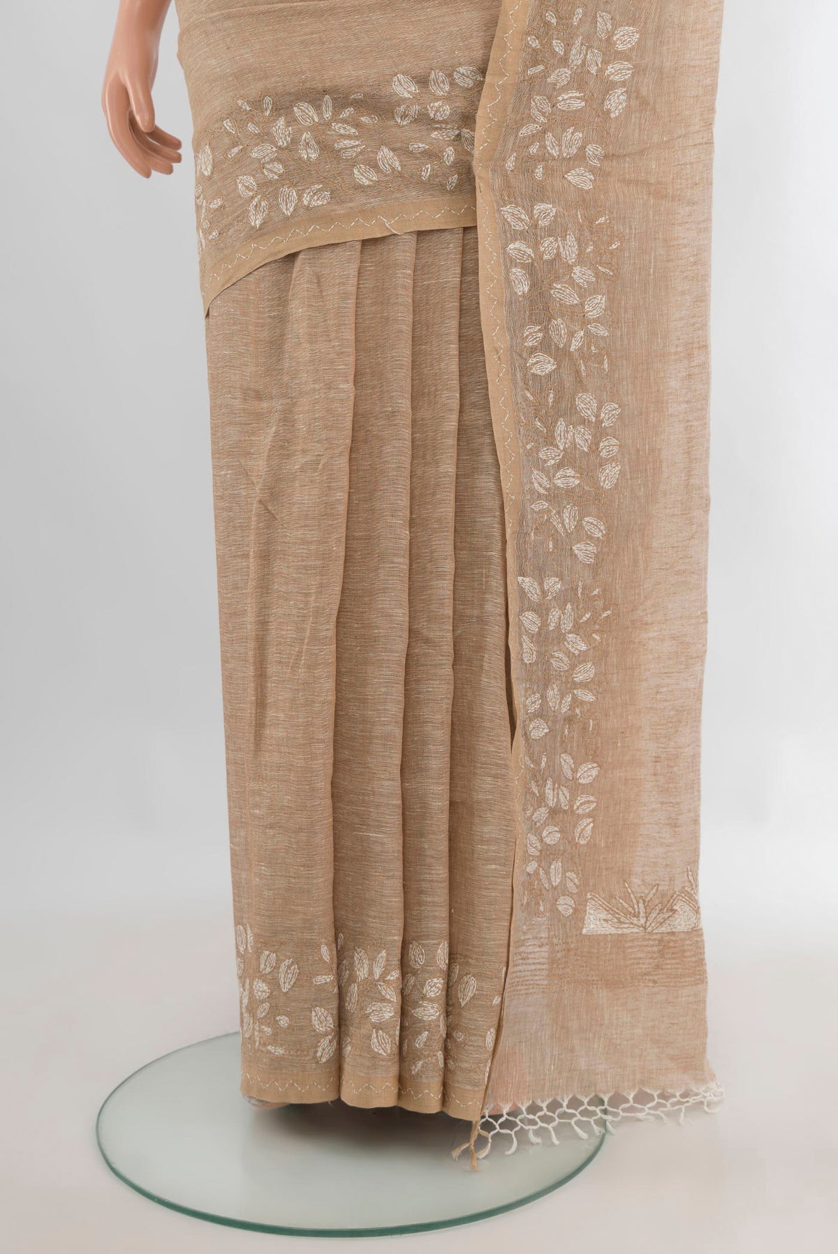 Pleats and pallu of Beige Linen Saree with Plain Body and Embroidery Border. 