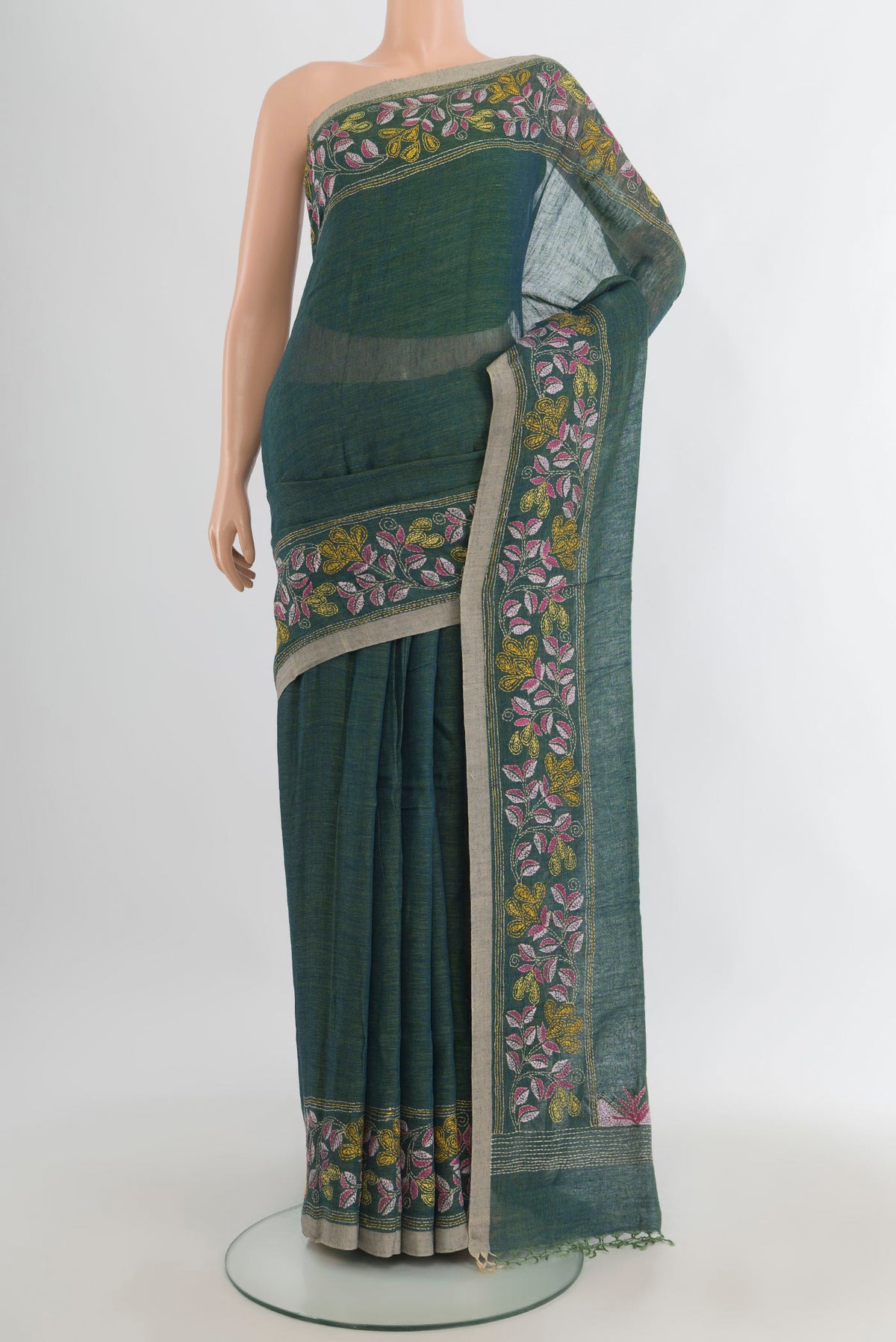 Sea Green Linen Saree with Plain Body and Embroidery Border.  displayed on a mannequin
