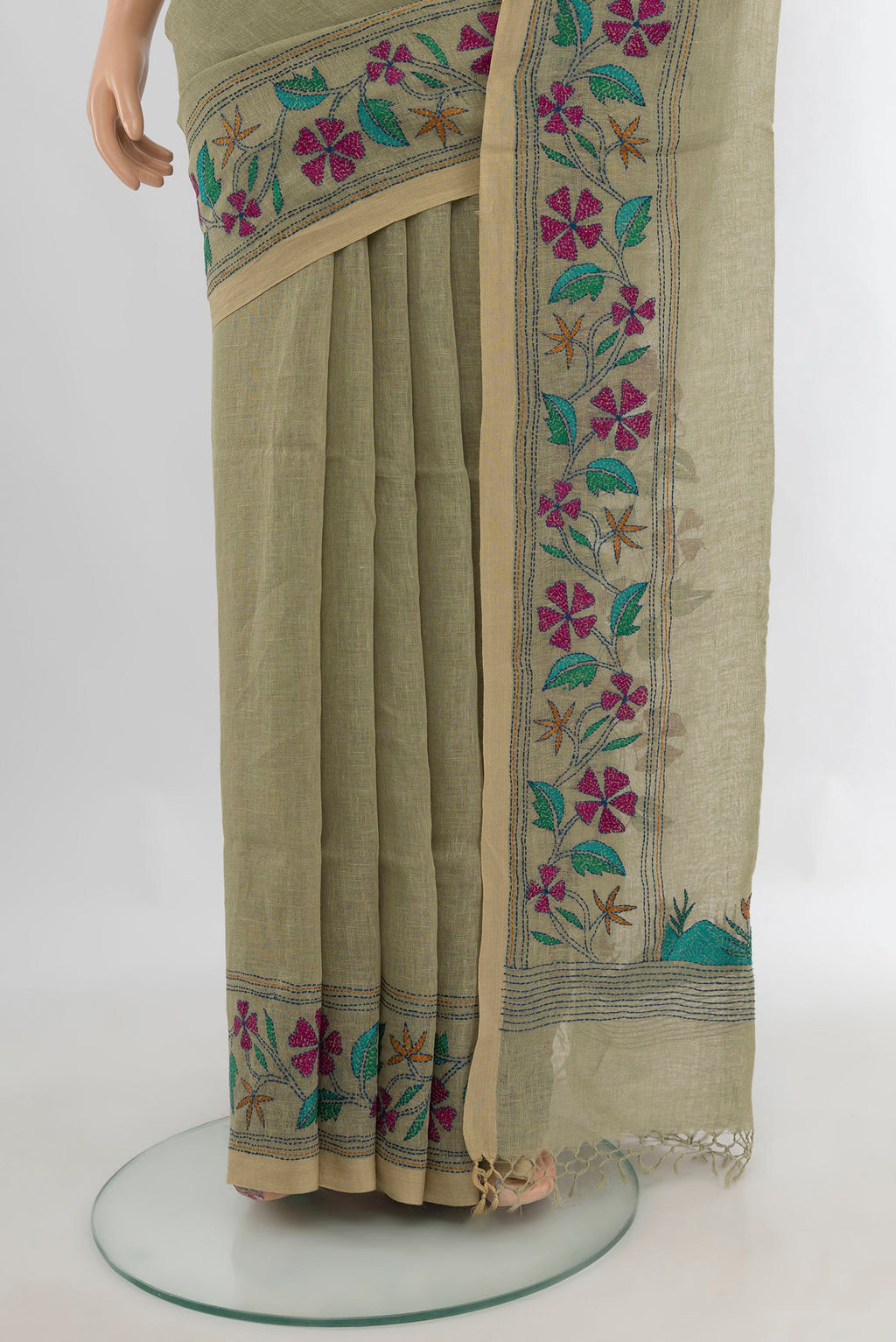 Pleats and pallu of Olive Green Linen Saree with Plain Body and Embroidery Border. 