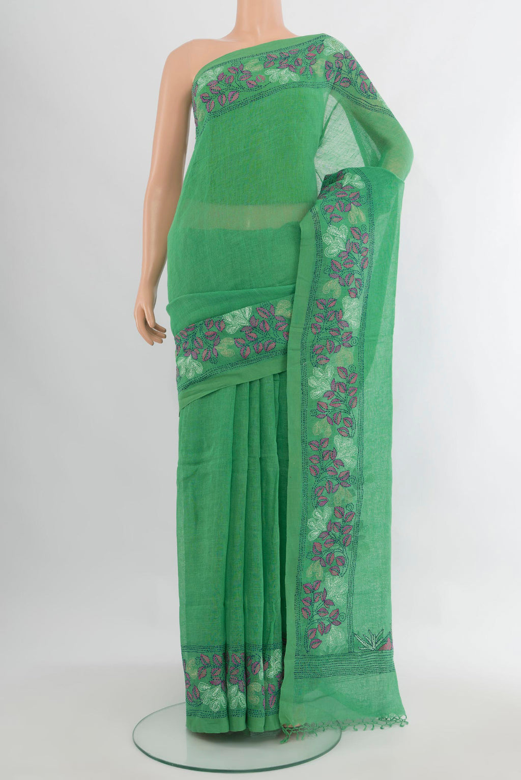 Pure Silk Sea Green Linen Saree with Plain Body and Embroidery Border.  displayed on a mannequin