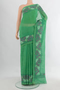 Pure Silk Sea Green Linen Saree with Plain Body and Embroidery Border.  displayed on a mannequin