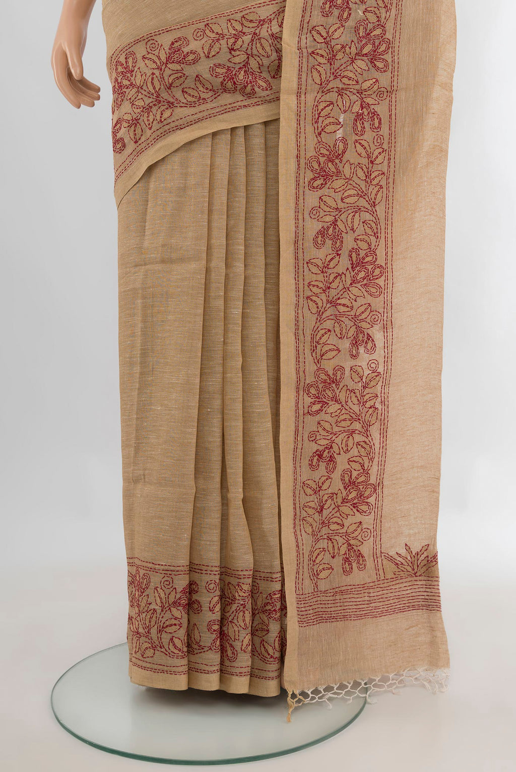 Pleats and pallu of Beige Linen Saree with Plain Body and Embroidery Border. 