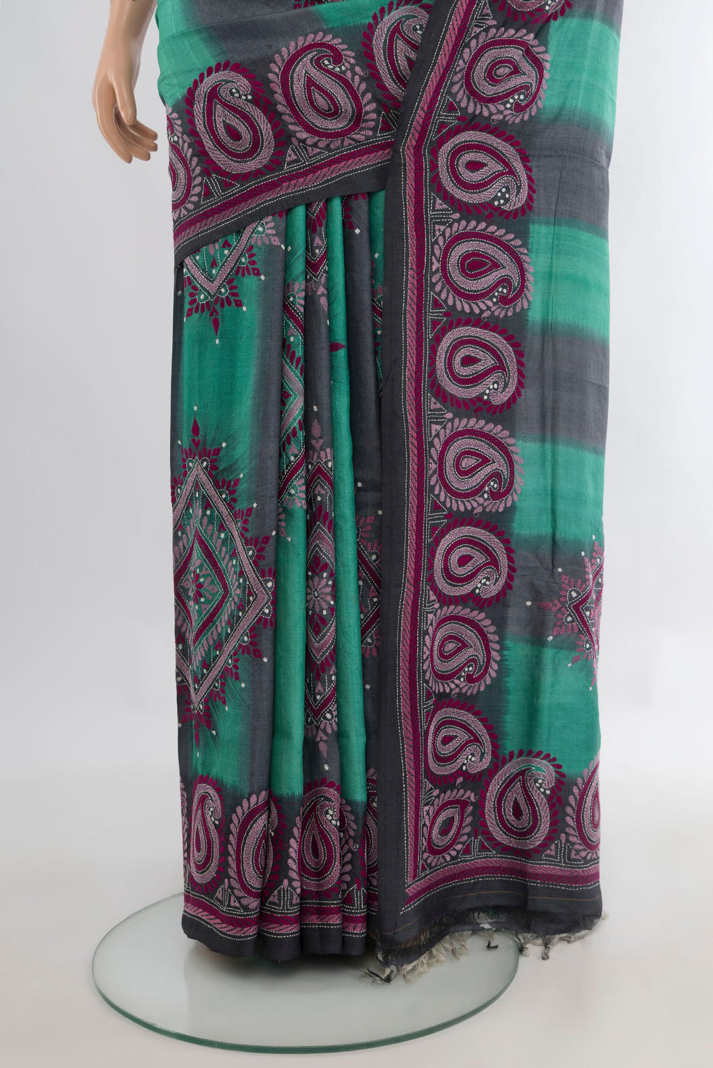 Pleats and pallu of Multi Color Tussar Saree with Kantha Work on the body and Silk Border. 
