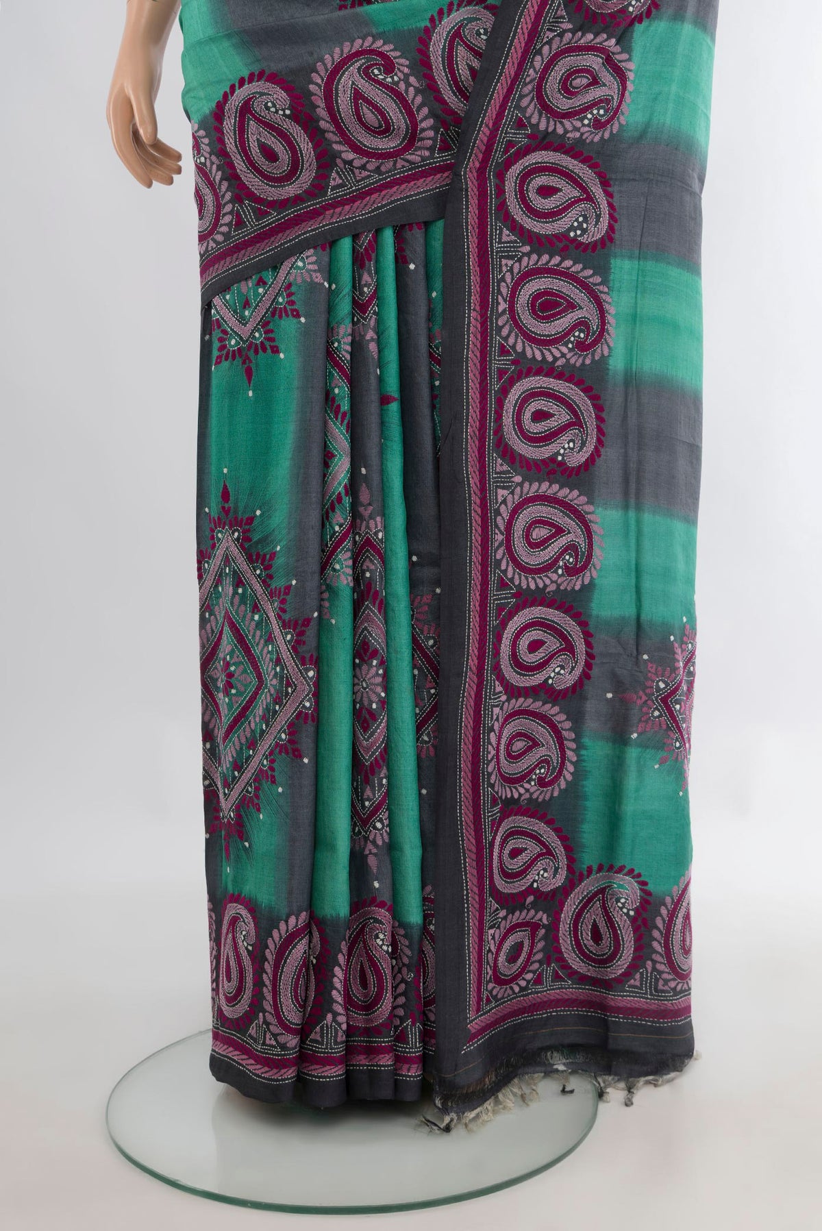 Pleats and pallu of Multi Color Tussar Saree with Kantha Work on the body and Silk Border. 