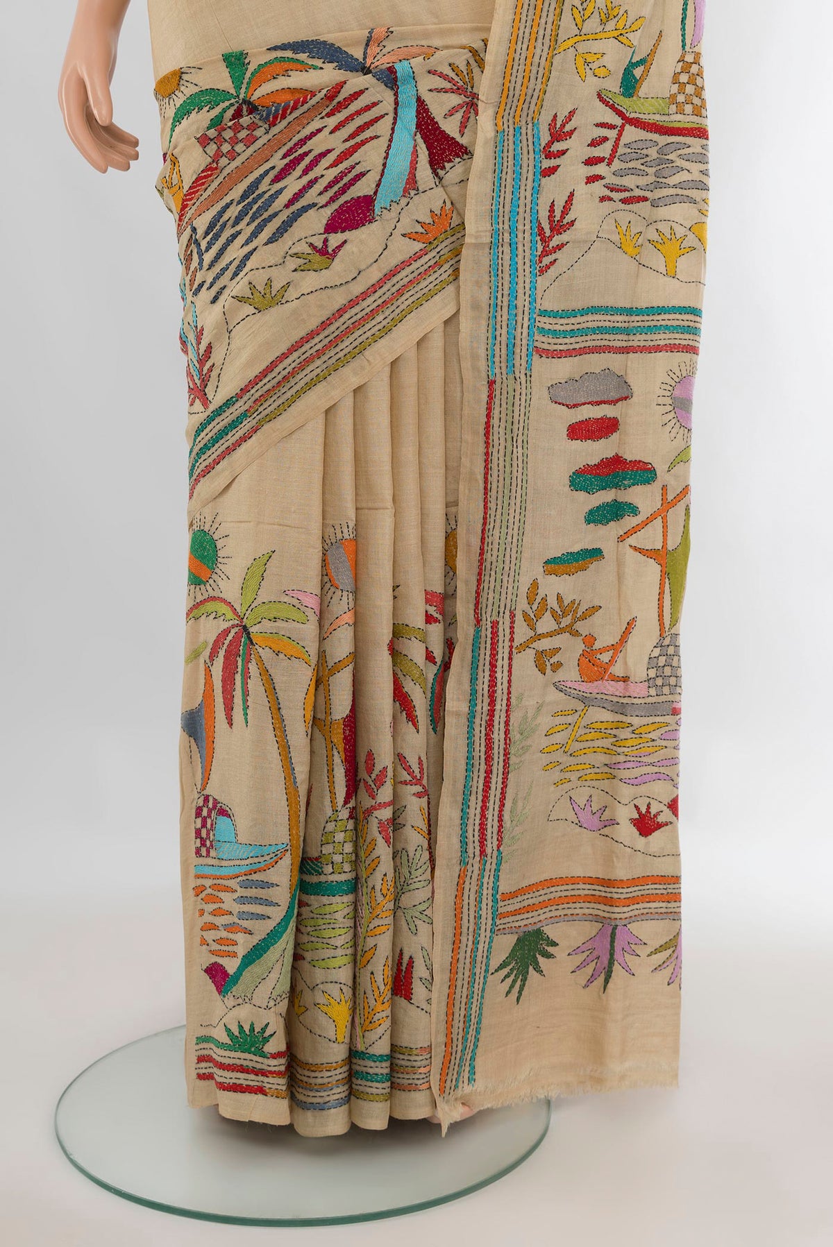 Pleats and pallu of Sandal Tussar Saree with Embroidery on the body and Embroidery Border. 