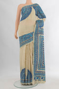 Cream Tussar Saree with Plain Body and Embroidery Border.  displayed on a mannequin