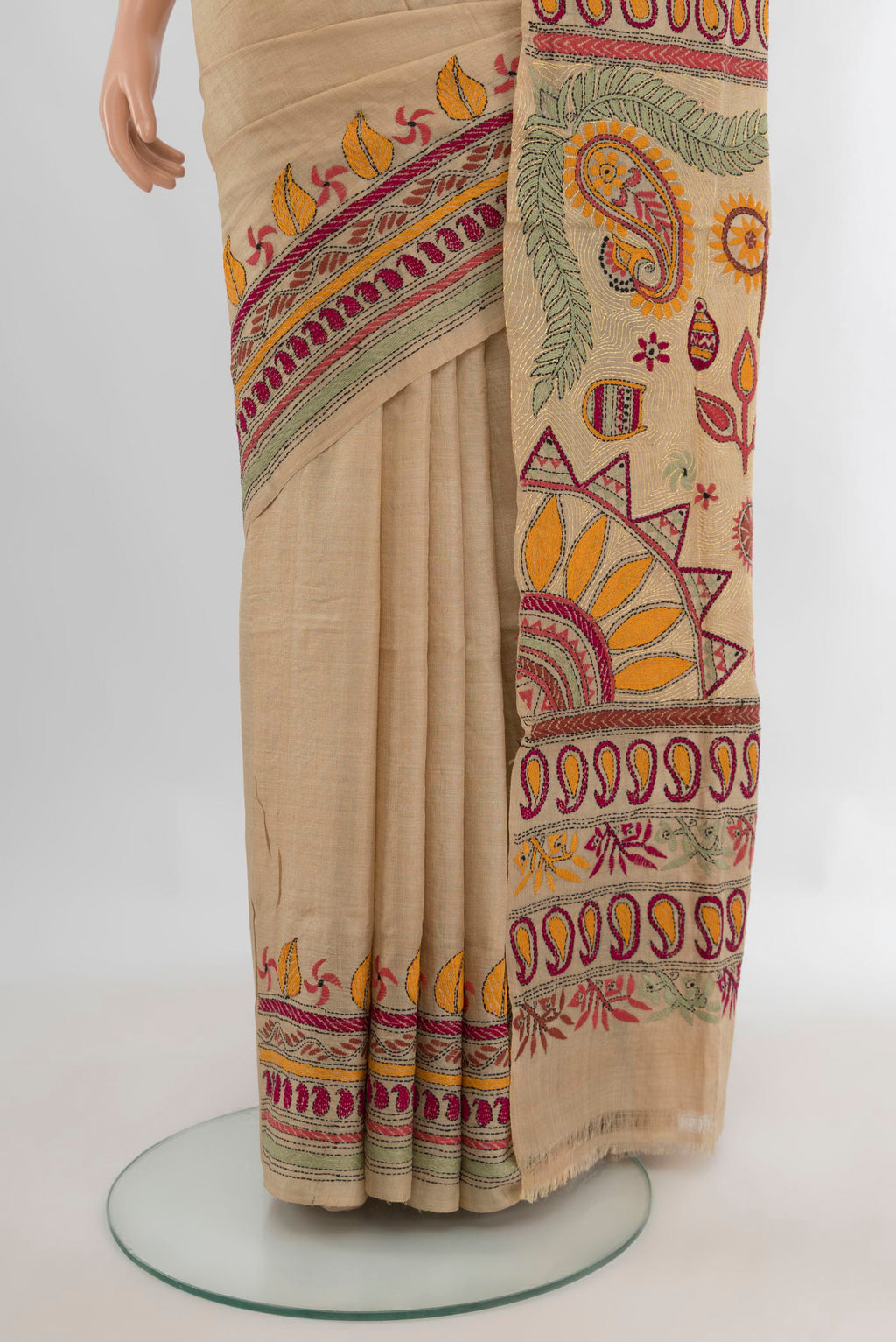 Pleats and pallu of Beige Tussar Saree with Plain Body and Embroidery Border. 