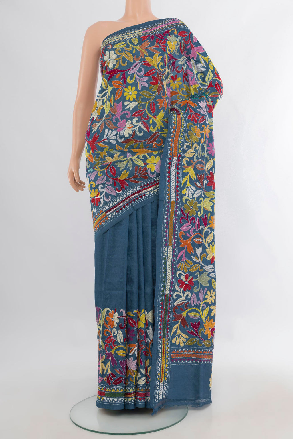 Blue Grey Tussar Saree with Kantha Work on the body and Embroidery Border.  displayed on a mannequin