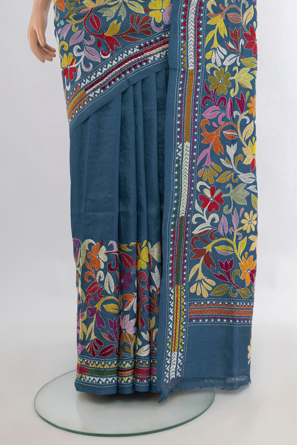 Pleats and pallu of Blue Grey Tussar Saree with Kantha Work on the body and Embroidery Border. 