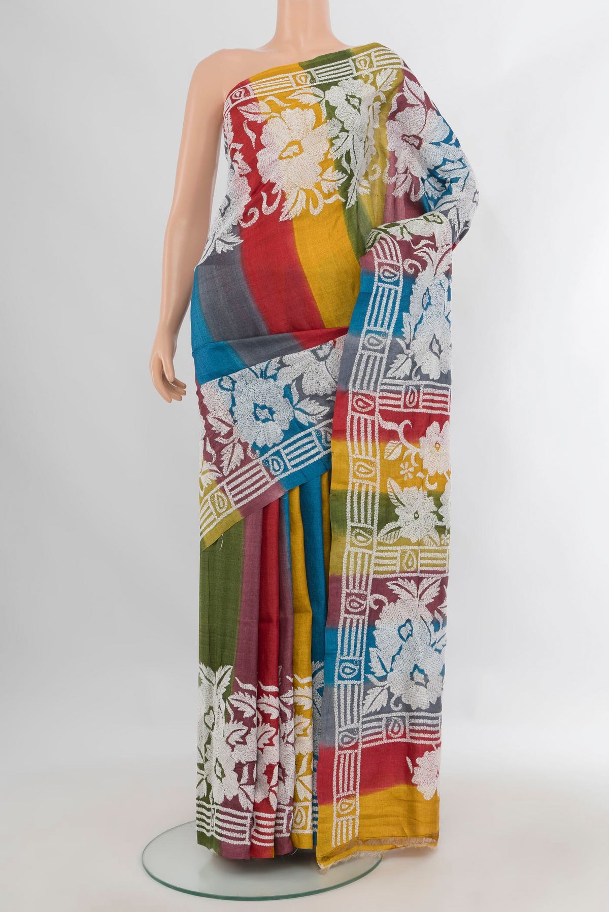 Multi Color Tussar Saree with Kantha Work on the body and Embroidery Border.  displayed on a mannequin