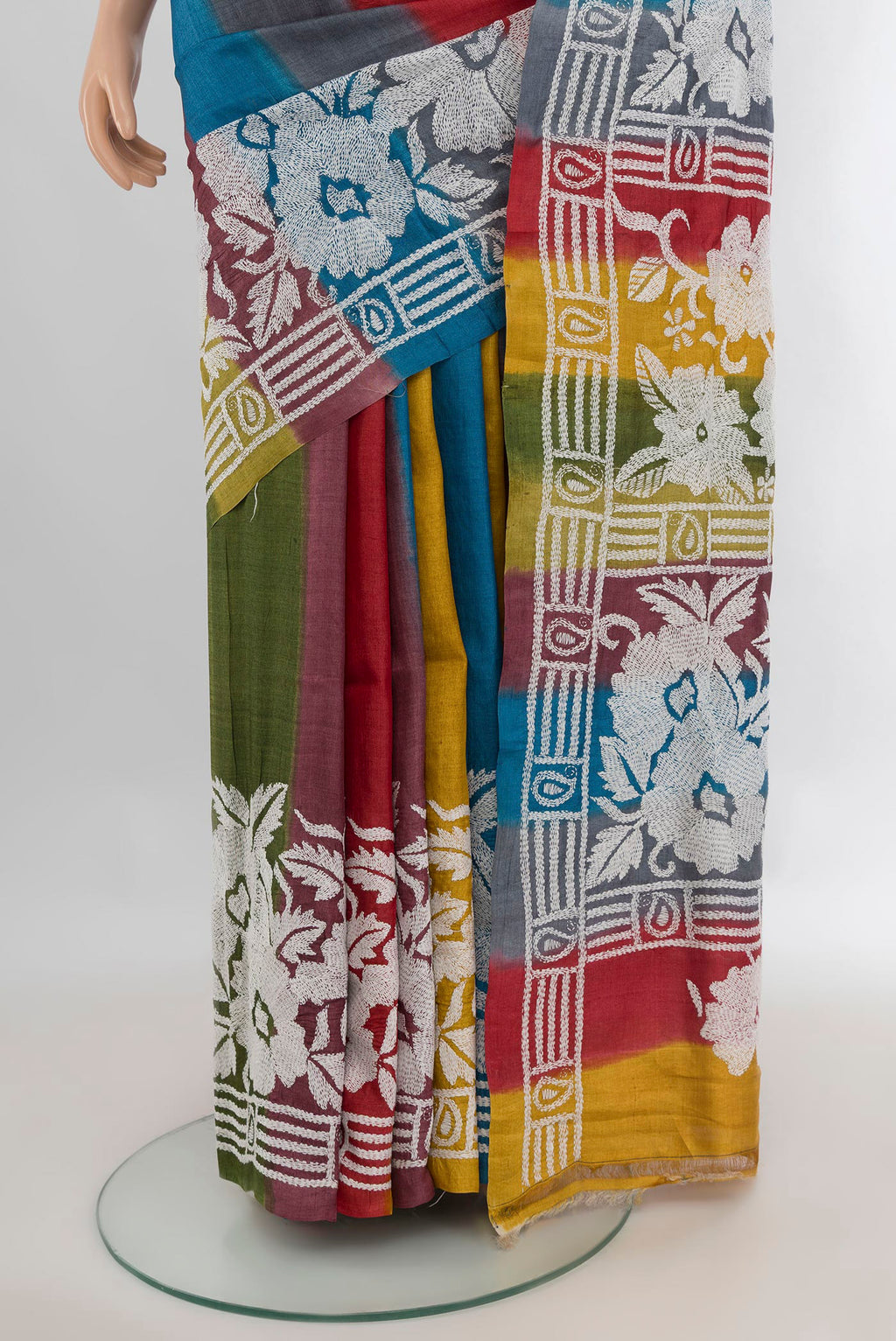 Pleats and pallu of Multi Color Tussar Saree with Kantha Work on the body and Embroidery Border. 