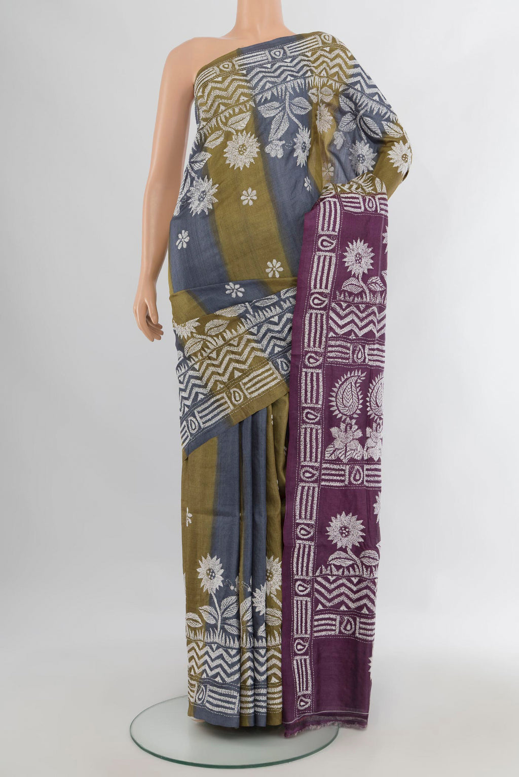 Multi Color Tussar Saree with Kashmiri Work on the body and Embroidery Border.  displayed on a mannequin