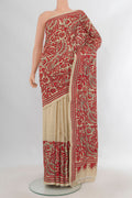 Beige Tussar Saree with Kantha Work on the body and Thread Embroidery Border.  displayed on a mannequin