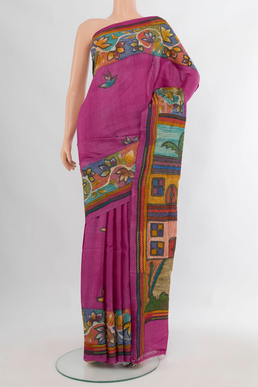 Magenta Tussar Saree with Kantha Work on the body and Embroidery Border.  displayed on a mannequin