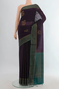 Navy Blue Silk Cotton Saree with Zari Butta on the body and Without Border.  displayed on a mannequin