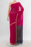 Pink Silk Cotton Saree with Zari And Thread Butta on the body and Zari Border.  displayed on a mannequin