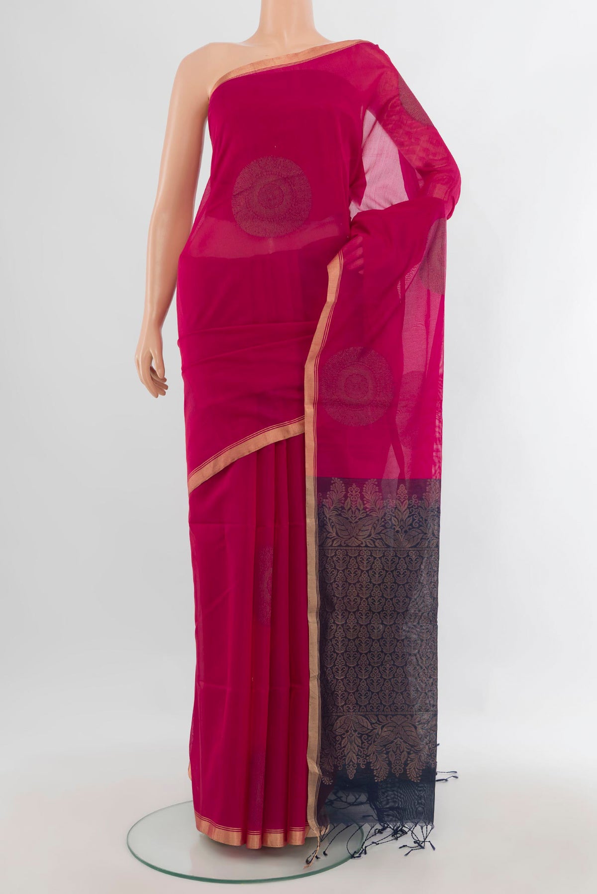 Pink Silk Cotton Saree with Zari And Thread Butta on the body and Zari Border.  displayed on a mannequin
