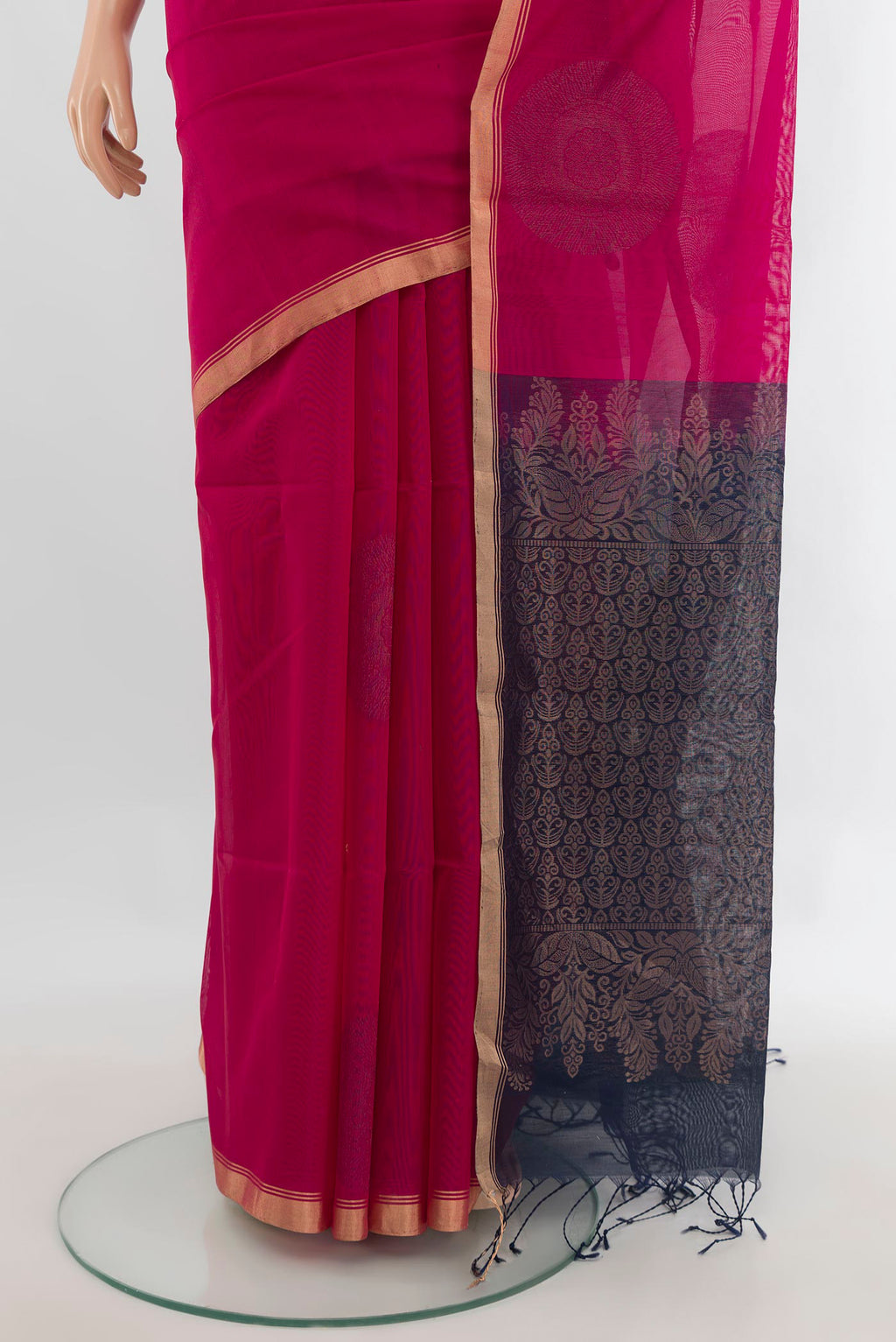 Pleats and pallu of Pink Silk Cotton Saree with Zari And Thread Butta on the body and Zari Border. 