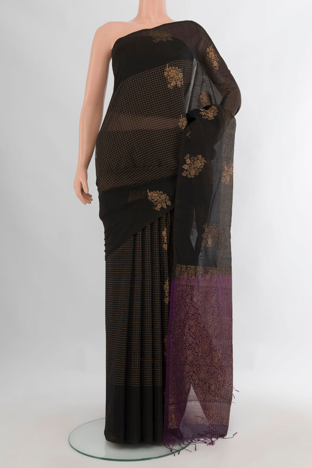 Black Silk Cotton Saree with Checked design on the body and Plain Border.  displayed on a mannequin