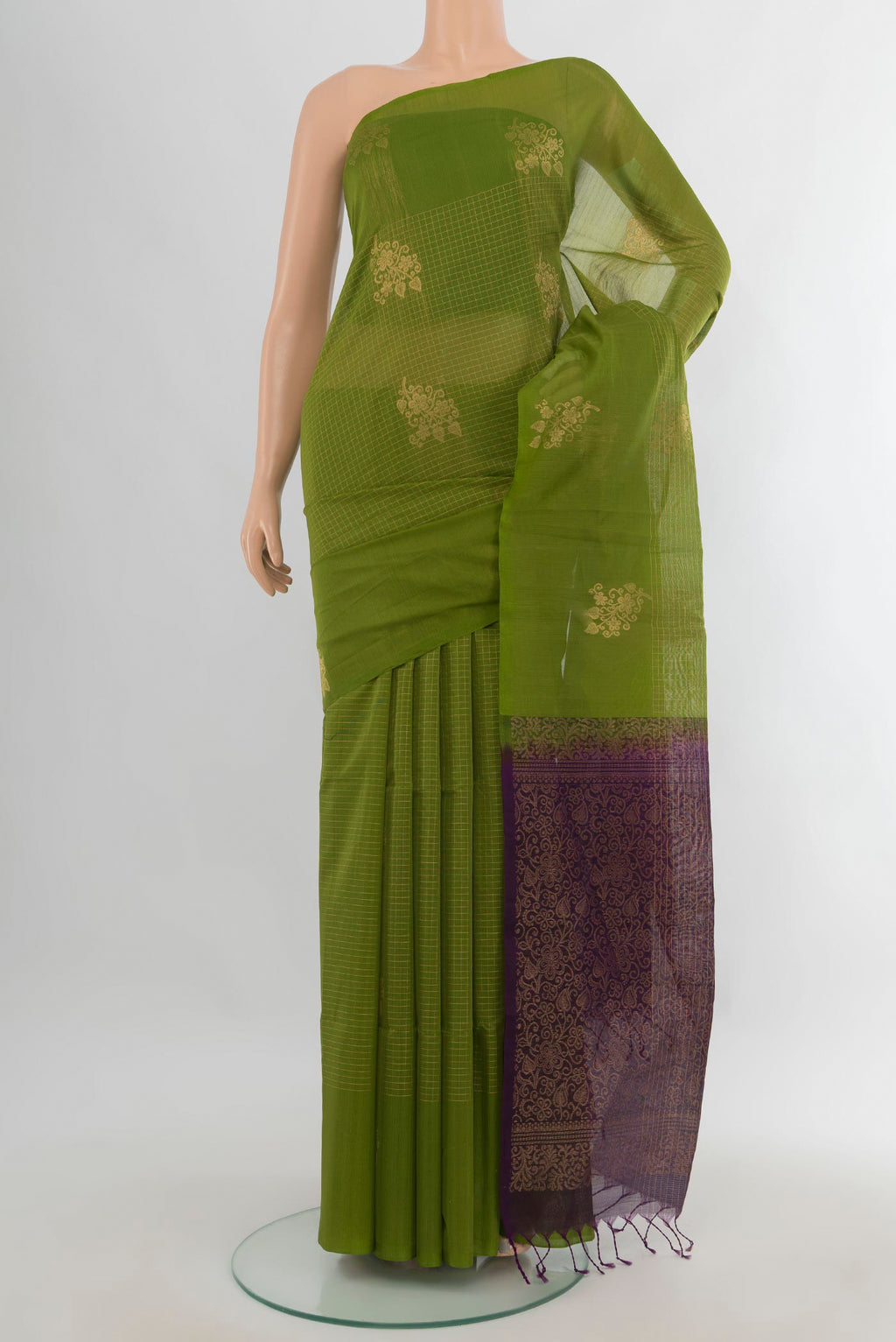 Light Green Silk Cotton Saree with Checked design on the body and Without Border.  displayed on a mannequin