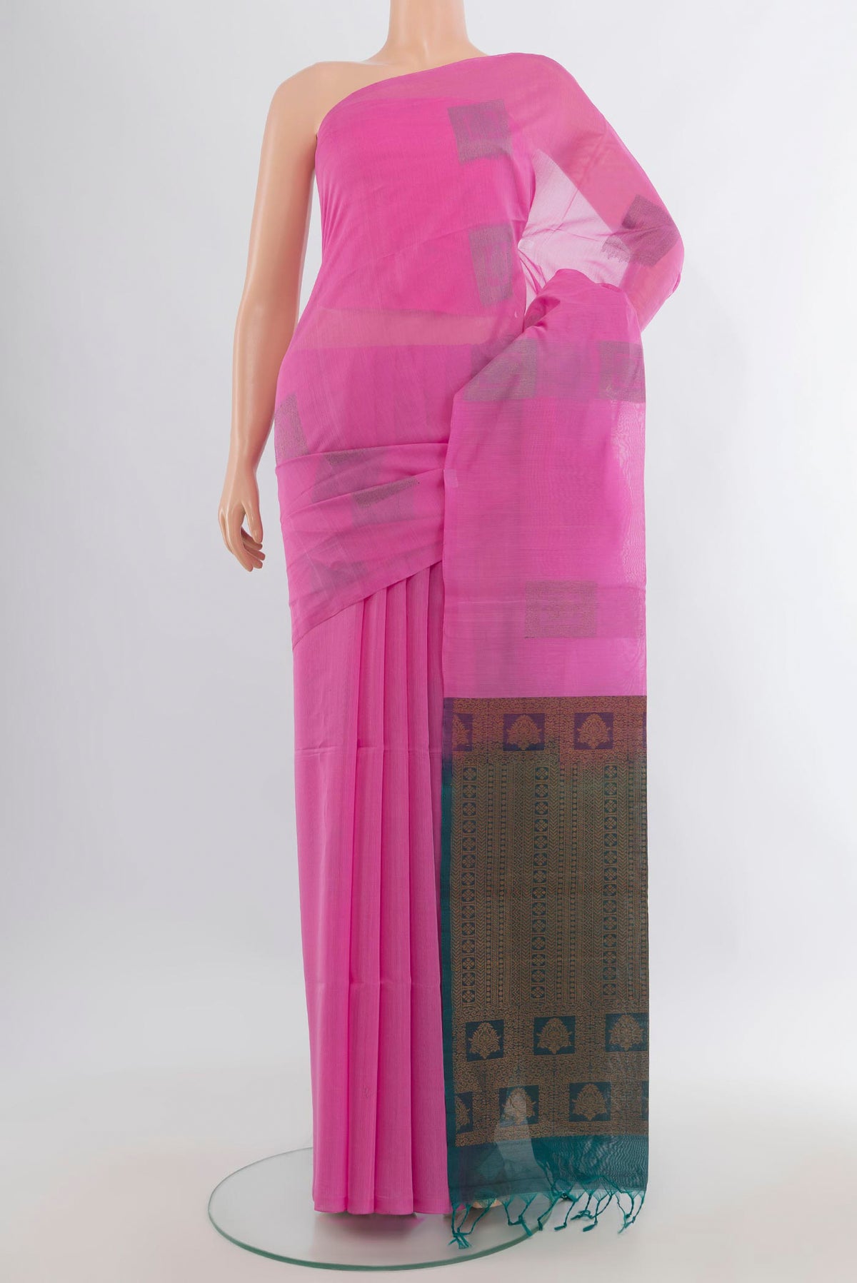 Rose pink Silk Cotton Saree with Thread Butta on the body and Without Border.  displayed on a mannequin