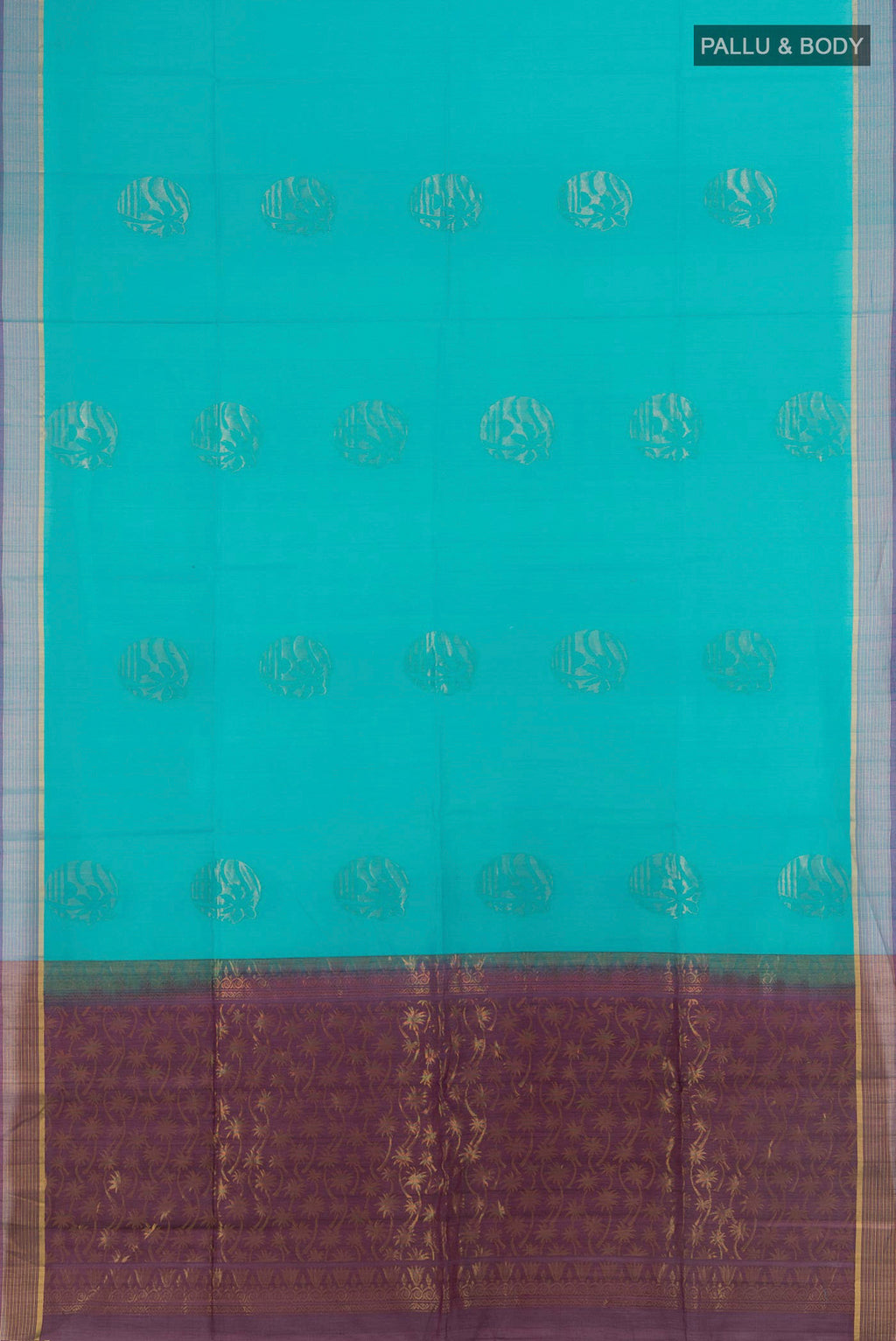 Flat view of Light Blue Silk Cotton Saree with Zari Butta on the body and Zari Border. 