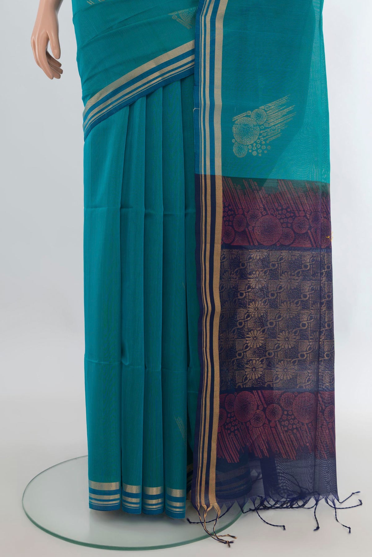 Pleats and pallu of Peacock Blue Silk Cotton Saree with Zari Butta on the body and Zari Border. 