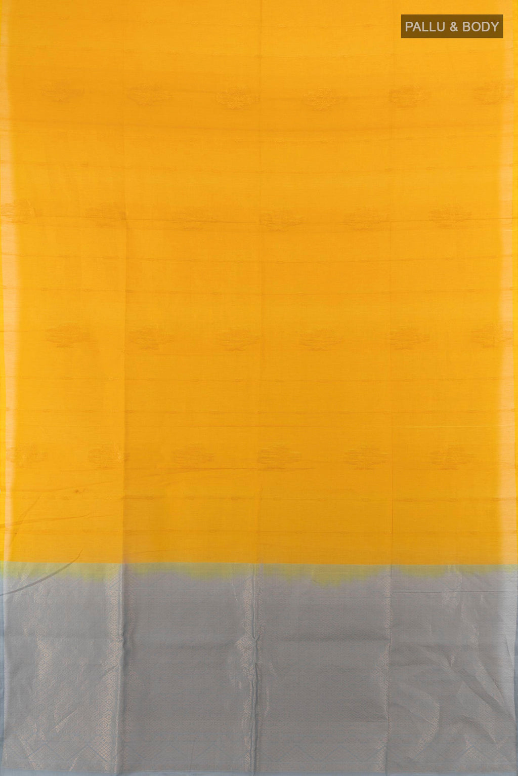 Flat view of Yellow Kora Cotton Saree with Zari Butta on the body and Silk Border. 