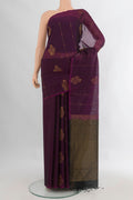 Purple Silk Cotton Saree with Zari Butta on the body and Without Border.  displayed on a mannequin