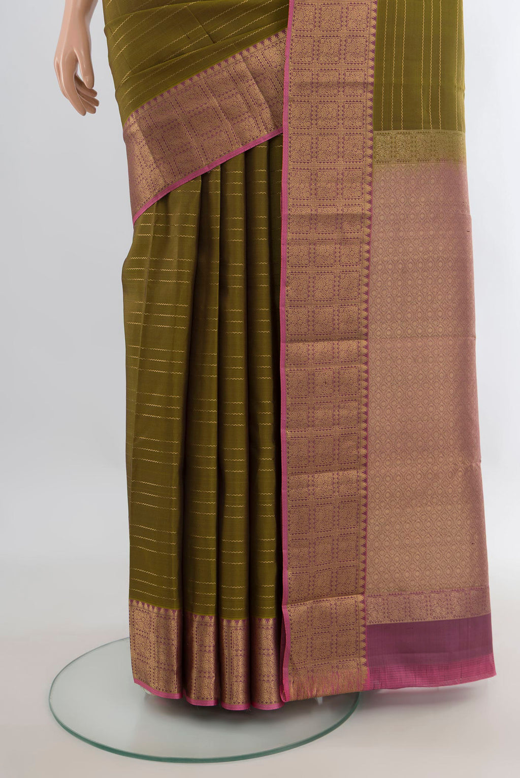 Pleats and pallu of Pure Silk Mehandi Green Kanchipuram Saree with Stripes on the body and Zari Border. 