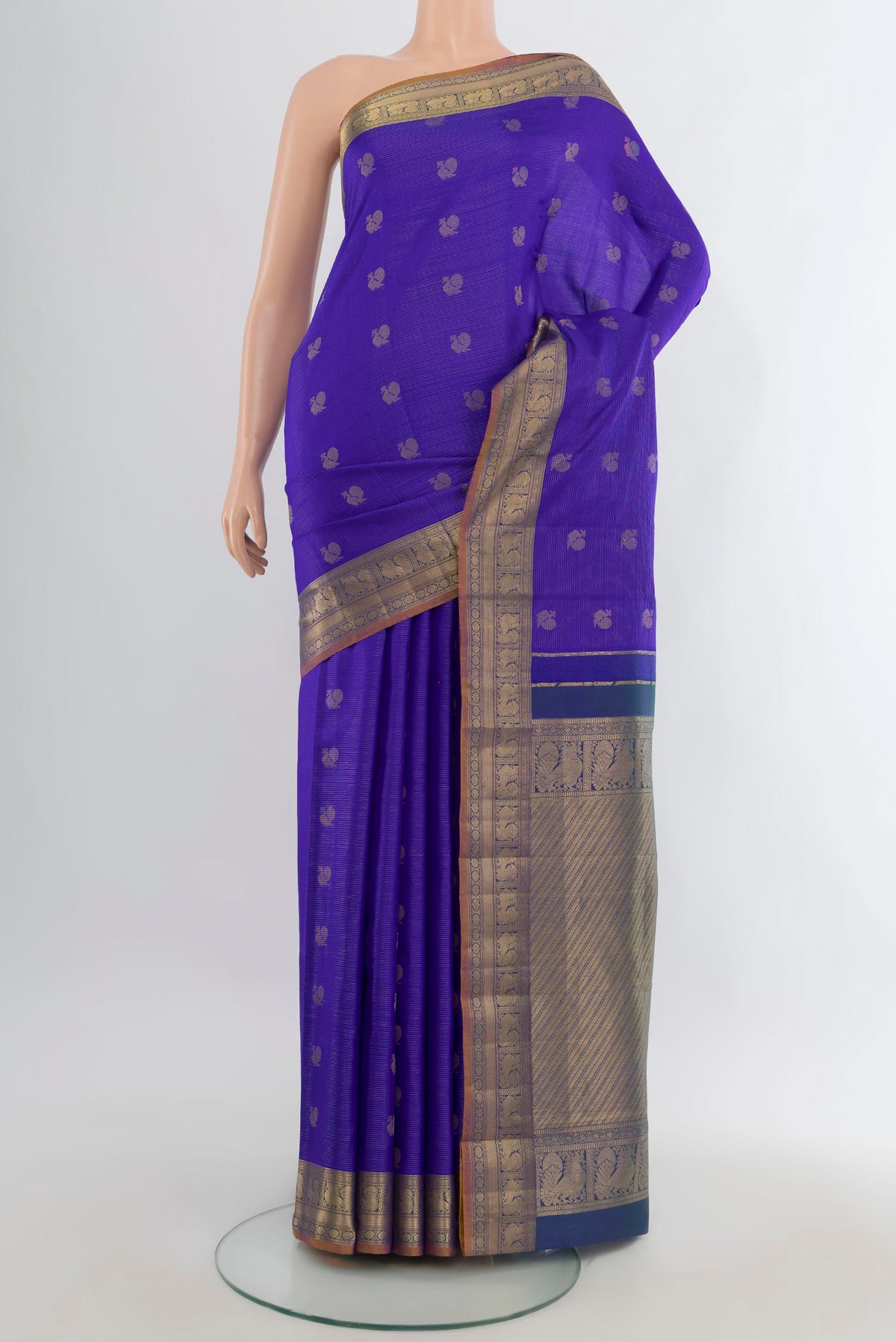 Pure Silk Royal Blue Kanchipuram Saree with Zari Butta on the body and Zari Border.  displayed on a mannequin