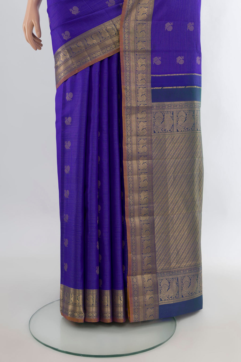 Pleats and pallu of Pure Silk Royal Blue Kanchipuram Saree with Zari Butta on the body and Zari Border. 