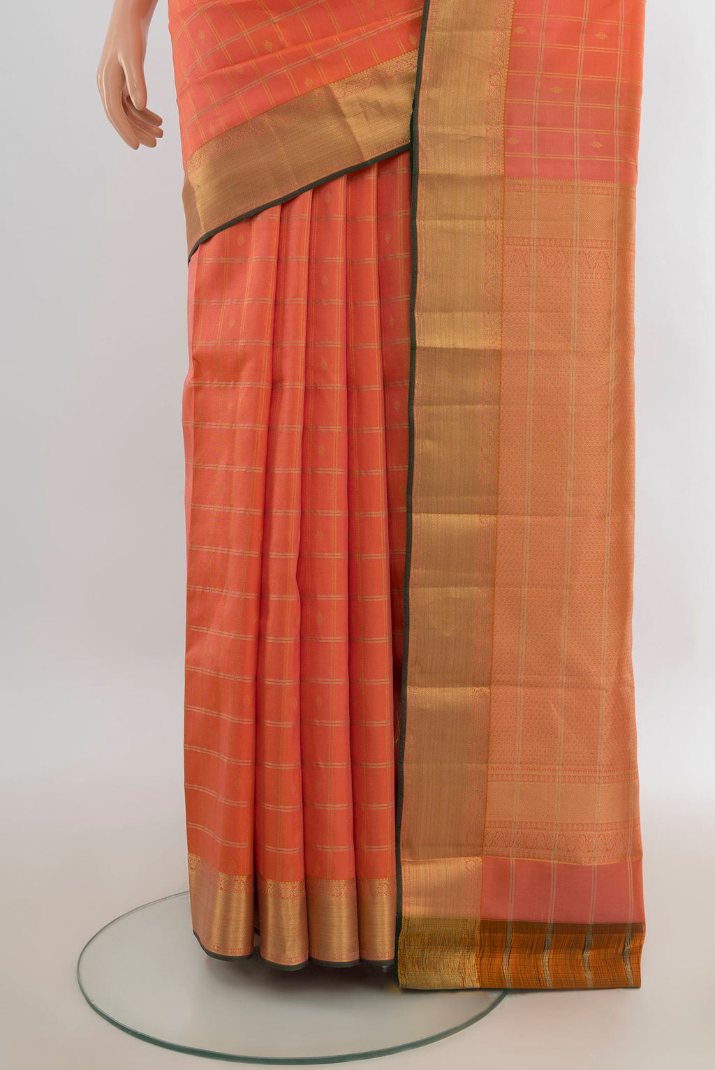 Pleats and pallu of Pure Silk Rose Gold Kanchipuram Saree with Zari Butta on the body and Silk Border. 