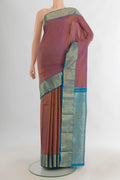 Pure Silk Purple with Mustard Color Kanjivaram Saree with Stripes on the body and Zari Border.  displayed on a mannequin