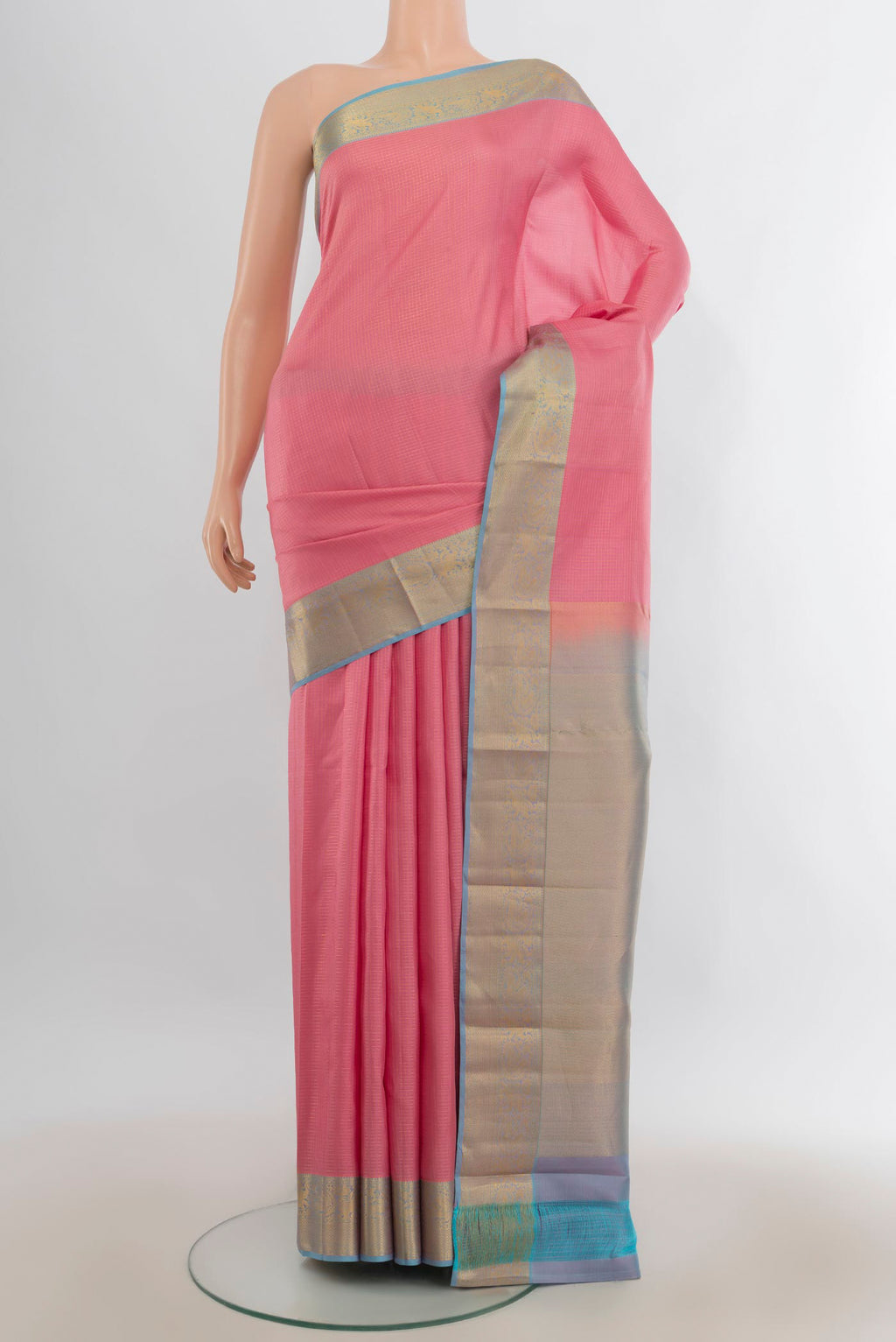 Pure Silk Pink Kanchipuram Saree with Checked design on the body and Zari Border.  displayed on a mannequin