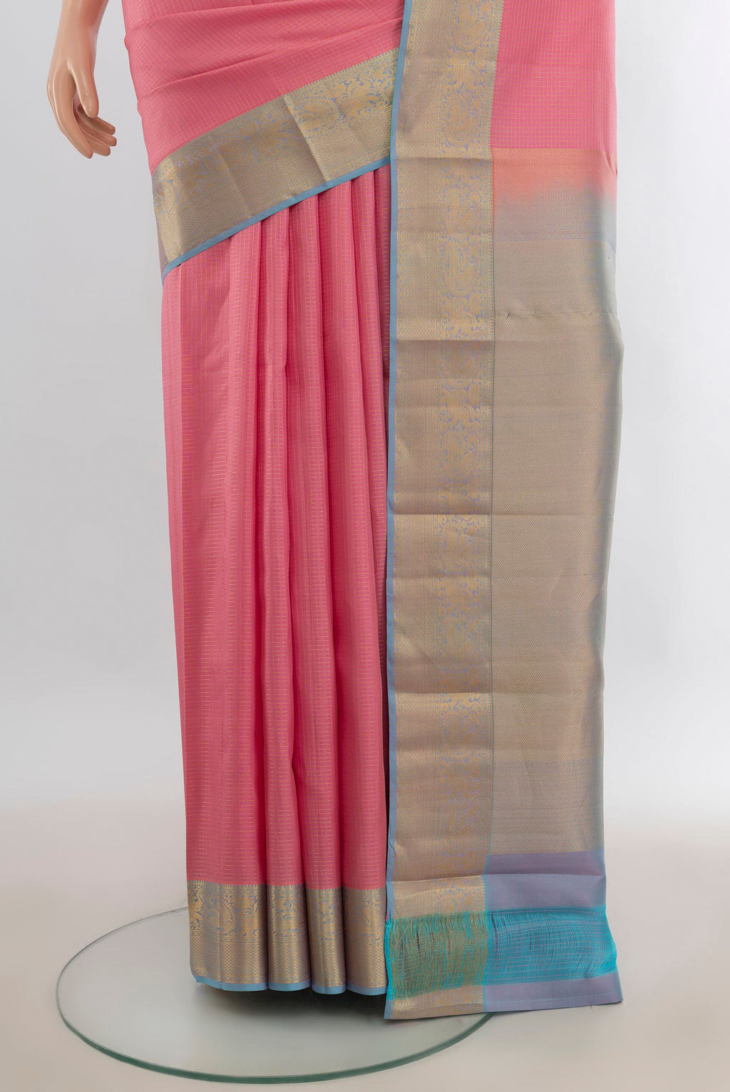 Pleats and pallu of Pure Silk Pink Kanchipuram Saree with Checked design on the body and Zari Border. 