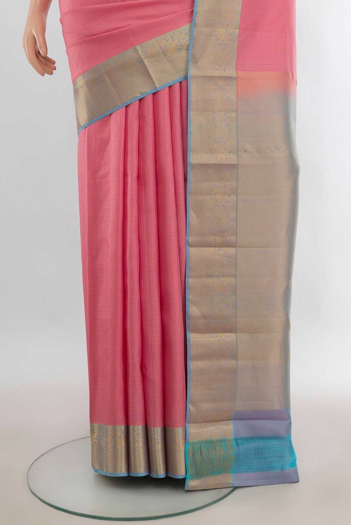 Pleats and pallu of Pure Silk Pink Kanchipuram Saree with Checked design on the body and Zari Border. 